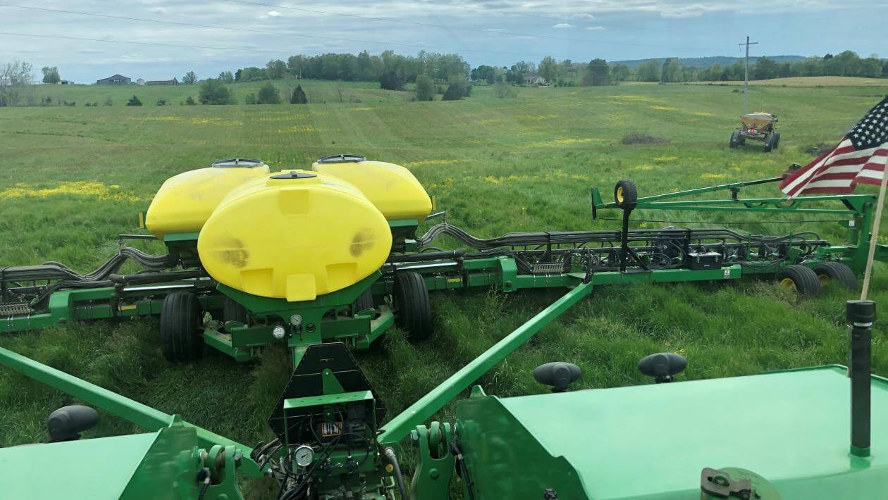 A tractor driving through a field
